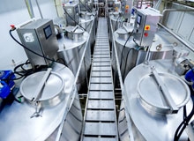 Efficient Strategies for Heating Industrial Process Tanks